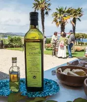  ??  ?? Locally-bottled olive oil enhances a wine-andcheese tasting at La Chiusa winery, near Portoferra­io, Elba.