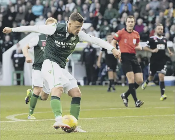  ??  ?? 2 Front man Florian Kamberi scores Hibs’ fifth goal against Hamilton on Saturday as Neil Lennon’s men closed to within two points of league leaders Hearts