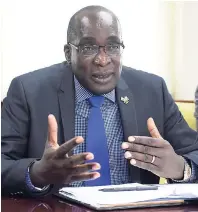  ?? FILE ?? Senator Ruel Reid, minister of education, youth and informatio­n.