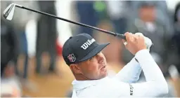  ??  ?? Gary Woodland hits his tee shot on the 7th tee box during final-round action at the Waste Management Phoenix Open.