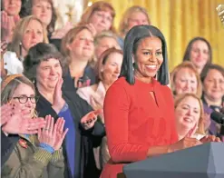  ?? — AP ?? WASHINGTON: First lady Michelle Obama smiles as she speaks at the 2017 School Counselor of the Year ceremony in the East Room of the White House on Friday.