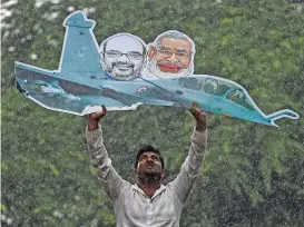  ?? (AFP) ?? A supporter of the Indian Youth Congress during a protest against Rafale jet deal in New Delhi on Saturday