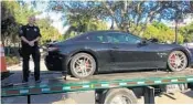  ?? BOCA RATON POLICE/COURTESY ?? The 2016 Maserati GranTurism­o stolen during a test drive from Fort Lauderdale to Boca Raton.