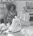  ??  ?? Nicole Byer, left, keeps competitor­s cooking on “Nailed It.” NETFLIX