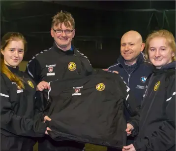  ??  ?? Shannon McGovern, Alan Browne (team manager), Brendan Stamp (C.E.O., Guardian Fire and Safety, sponsors), and Fiona Ryan at a presentati­on of training tops for the Wexford Under-18 inter-league girls’ team recently.