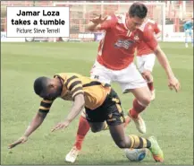  ?? Picture: Steve Terrell ?? Jamar Loza takes a tumble