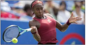  ?? (AP/Alex Brandon) ?? Coco Gauff of the United States hits a return to Maria Sakkari of Greece during the women’s singles final of the DC Open on Sunday in Washington. Gauff won 6-2, 6-3.