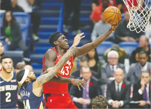  ?? Chuck Cook / USA TODAY Sports files ?? Toronto Raptors forward Pascal Siakam, pictured going to the hoop in November, was sidelined along with teammates Norm Powell and Marc Gasol following a victory over Detroit preceding the Christmas holidays.