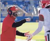  ?? UGA Sports Communicat­ions - Mark Cornelison ?? Georgia coach Kirby Smart greets defensive back Ameer Speed during the Bulldogs’ game last season at Kentucky.