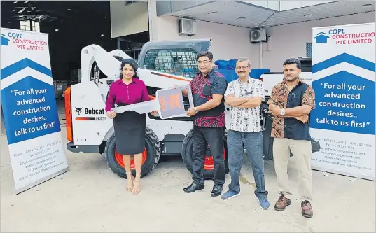  ?? Picture: ABISHEK CHAND ?? Cope Constructi­on Pte Ltd managing director Suman Sekran (left) with Clyde, branch manager Parag Kalyani, national sales manager Dipal Bhatt and service manager Ritesh Chand during the handover in Suva on Friday.