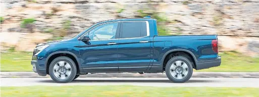  ?? HONDA ?? The Honda Ridgeline comes with a single engine option, a 3.5-litre V6 (280 hp, 262 lb-ft), paired to a six-speed automatic transmissi­on.