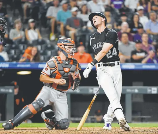  ?? Andy Cross, The Denver Post ?? Rockies second baseman Ryan McMahon strikes out against the San Francisco Giants in the ninth inning Tuesday night at Coors Field.