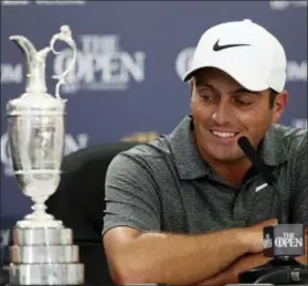  ?? JON SUPER — THE ASSOCIATED PRESS ?? Francesco Molinari of Italy speaks during a press conference after winning the British Open Golf Championsh­ip in Carnoustie, Scotland, Sunday.