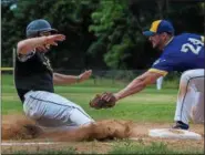  ?? ADRIANNA LYNCH — FOR DIGITAL FIRST MEDIA ?? Valley Forge’s Mike Fazio slides to third base as Ambler’s Jason Kelmer gets him out.