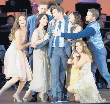  ?? Photograph­s by Craig T. Mathew and Greg Grudt Mathew Imaging ?? JONATHAN GROFF, center, was among the many experience­d Broadway singers in ‘“Sondheim on Sondheim” at the Hollywood Bowl.