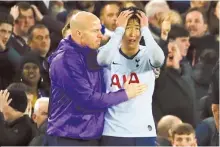  ?? Reuters-Yonhap ?? Tottenham’a Son Heung-min looks dejected after Everton’s Andre Gomes sustains an injury during the game in Liverpool, Britain, Sunday.