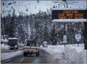  ?? BRONTË WITTPENN — SAN FRANCISCO CHRONICLE VIA AP ?? Huge amounts of snow are seen after a series of storms blasted communitie­s surroundin­g South Lake Tahoe on Jan. 4. California Gov. Gavin Newsom on Friday announced an end to some drought restrictio­ns and calls for water conservati­on following a series of winter storms that have dramatical­ly improved the state's water supply outlook.