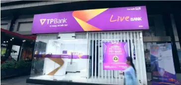  ?? Photo courtesy of Tpbank ?? Tpbank has a Livebank model, which provides basic services of a transactio­n office. Many banks have cut their costs to income ratio thanks to digital transforma­tion.