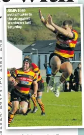  ?? ?? JUMP: Sligo outhalf takes to the air against Wanderers last Saturday.