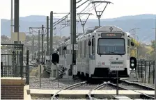  ?? Joe Amon, THE DENVER POST ?? In this 2019 file photo the C and D Line trains line up at the Littleton/ Mineral Station for their runs to Union Station. Officials with the Regional Transporta­tion District are grappling with budget cuts and a ridership decline.