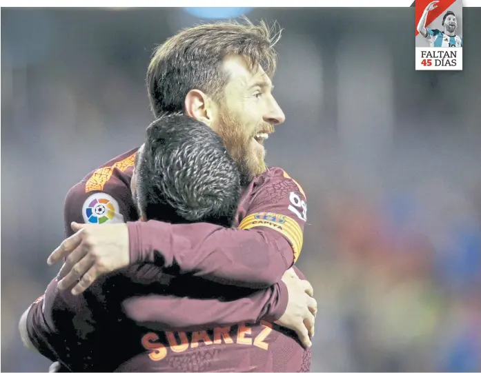  ?? Miguel vidal / reuterS ?? El abrazo del rosarino con Luis Suárez, su gran socio en la campaña triunfal e invicta del Barcelona en la Liga española