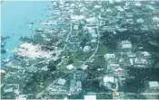  ?? MEDIC CORPS/AP ?? The destructio­n from Hurricane Dorian on Man-o-War Cay, Bahamas, on Tuesday.