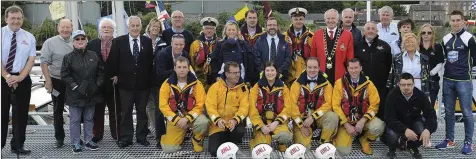  ??  ?? Members of the RNLI At The Launch