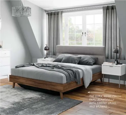  ??  ?? the dark wood finish pairs beautifull­y with earthy greys and browns