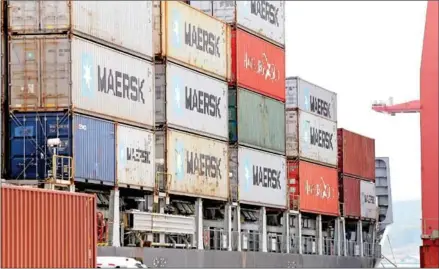  ?? HONG MENEA ?? Containers loaded on a cargo ship at Sihanoukvi­lle Autonomous Port (PAS) in Preah Sihanouk province in April 2023.