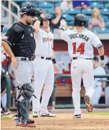  ?? ADOLPHE PIERRE-LOUIS/JOURNAL ?? Albuquerqu­e’s Mike Tauchman crosses the plate after driving in Ryan McMahon with a homer in the first inning of the Isotopes’ win over the Chihuahuas on Wednesday night.