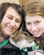  ?? JENNIFER SMITH PHOTO ?? This photo by Jennifer Smith and used as her new Facebook profile picture, shows Jayme Closs, right, her aunt Jennifer and Molly the dog after they were reunited.