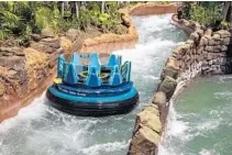  ?? PATRICK CONNOLLY/STAFF ?? The new Infinity Falls water ride is being tested at SeaWorld in Orlando. As of Friday, the park hadn’t announced an opening date.