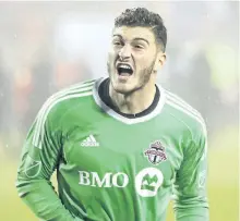  ?? CHRIS YOUNG/ THE CANADIAN PRESS ?? Goalkeeper Alex Bono celebrates after Toronto FC defeated the New York Red Bulls on away goals to win the MLS Eastern Conference semifinal earlier this month at BMO Field in Toronto.