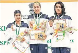  ?? HT PHOTO ?? Karnataka swimmer Suvana Baskar (left) with the 200m medley silver. She won three medals, including gold in 200m backstroke, at the Khelo India School Games.