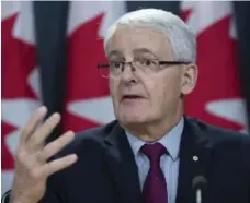  ?? SEAN KILPATRICK/THE CANADIAN PRESS ?? Marc Garneau says he’s also open to having the devices added to planes.