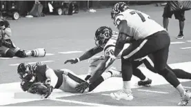  ?? ERIC CHRISTIAN SMITH/AP ?? Ravens linebacker L.J. Fort returns a fumble 22 yards for a touchdown Sunday.