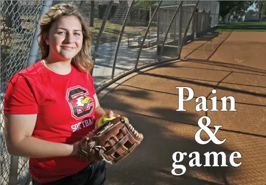  ?? Katharine Lotze/The Signal ?? Santa Clarita Christian’s Hailey Aguilar has dealt with an osteochond­ral defect of the talus bone since the fifth grade, which means her ankle bone was deteriorat­ing in both of her legs. Although the pain in her legs is permanent, she says it will not...