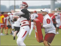  ?? NWA Democrat-Gazette/DAVID GOTTSCHALK ?? START ME UP: Arkansas Razorback quarterbac­k Cole Kelley runs through drills on Aug. 8 during football practice on campus in Fayettevil­le. The third-year sophomore was named by head coach Chad Morris as the starting quarterbac­k ahead of fourthyear junior Ty Storey during a press conference Monday.