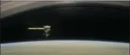  ?? NASA/JPL-CALTECH VIA AP ?? This image made available by NASA in April 2017shows a still from the short film “Cassini’s Grand Finale,” with the spacecraft diving between Saturn and the planet’s innermost ring. Launched in 1997, Cassini reached Saturn in 2004and has been exploring...