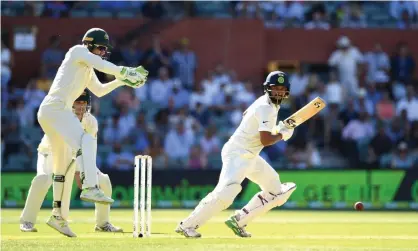  ??  ?? Cheteshwar Pujara steadied the Indian ship after a shaky start to the Test series at Adelaide Oval.Photograph: Dave Hunt/EPA