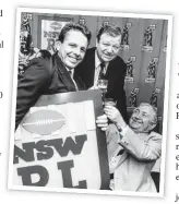  ?? AT LAST: Cowboys co- captains Matt Scott and Johnathan Thurston lift the Provan Summons Trophy after winning the club’s maiden NRL premiershi­p on Sunday night. BELOW: Kerry Boustead, John Lyons and Ron McLean after being admitted to the NSWRL competitio­n  ??