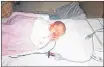  ?? SUBMITTED PHOTO ?? Emma, 11 days old, is pictured at the Queen Elizabeth Hospital after experienci­ng Sudden Infant Death Syndrome. The family is now trying to track down the people who helped tosave Emma’s life.