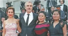  ??  ?? Marina de Tavira, Alfonso Cuarón, Yalitza Aparicio y Nancy García