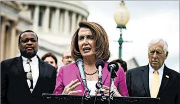  ?? AL DRAGO/BLOOMBERG NEWS ?? Democratic candidates are being pressed about whether they support House Minority Leader Nancy Pelosi, D-Calif.