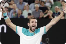  ??  ?? NAPASIGAW si Marin Cilic matapos makumpleto ang panalo at tanghaling unang Croatian na nakausad sa Australian Open finals sa Melbourne Park. AP