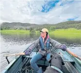  ?? ?? A spot of rowing and fly fishing after lunch.