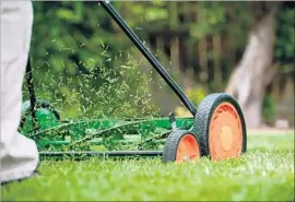  ?? BradWolfe Getty Images ?? WITH SUMMER ending soon, outdoor maintenanc­e products such as lawn mowers will reach low price levels in August. Buy now so you’ll be set for next year.