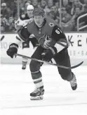  ??  ?? Coyotes forward Lawson Crouse skates against the Ducks on March 14 in Glendale. Lawson signed a new deal with the team on Tuesday.