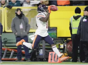  ?? AARON GASH/AP ?? Jakeem Grant scores on a 97-yard punt return in the second quarter against the Packers.