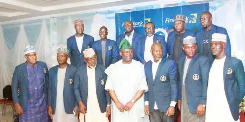  ??  ?? Front row—From left, Suleman Abubakar, Adamu Yaro, Bala Shehu Shagari, First Bank boss, Senator Hadi Sikira, Muhammad Babangida and Amani Idi. Back row from left, Babangida Hassan, Bello Buba, Dawule Baba, Kashim Bukar, Jamilu Mohamed and Ibrahim Mohammed.